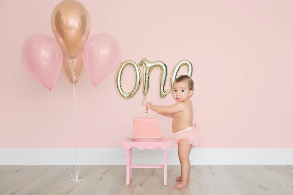 Cake smash photography auckland baby photo of Anya Rose at our family photography studio