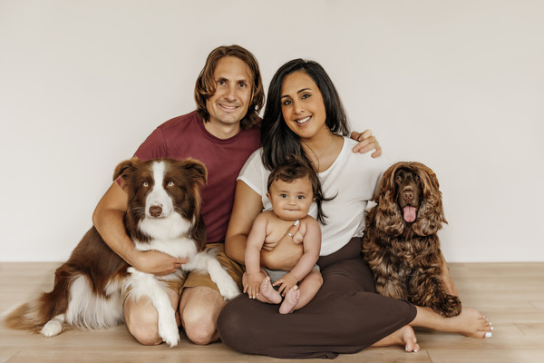 Family Portrait with baby and dogs taken at Milk Photography Studio 